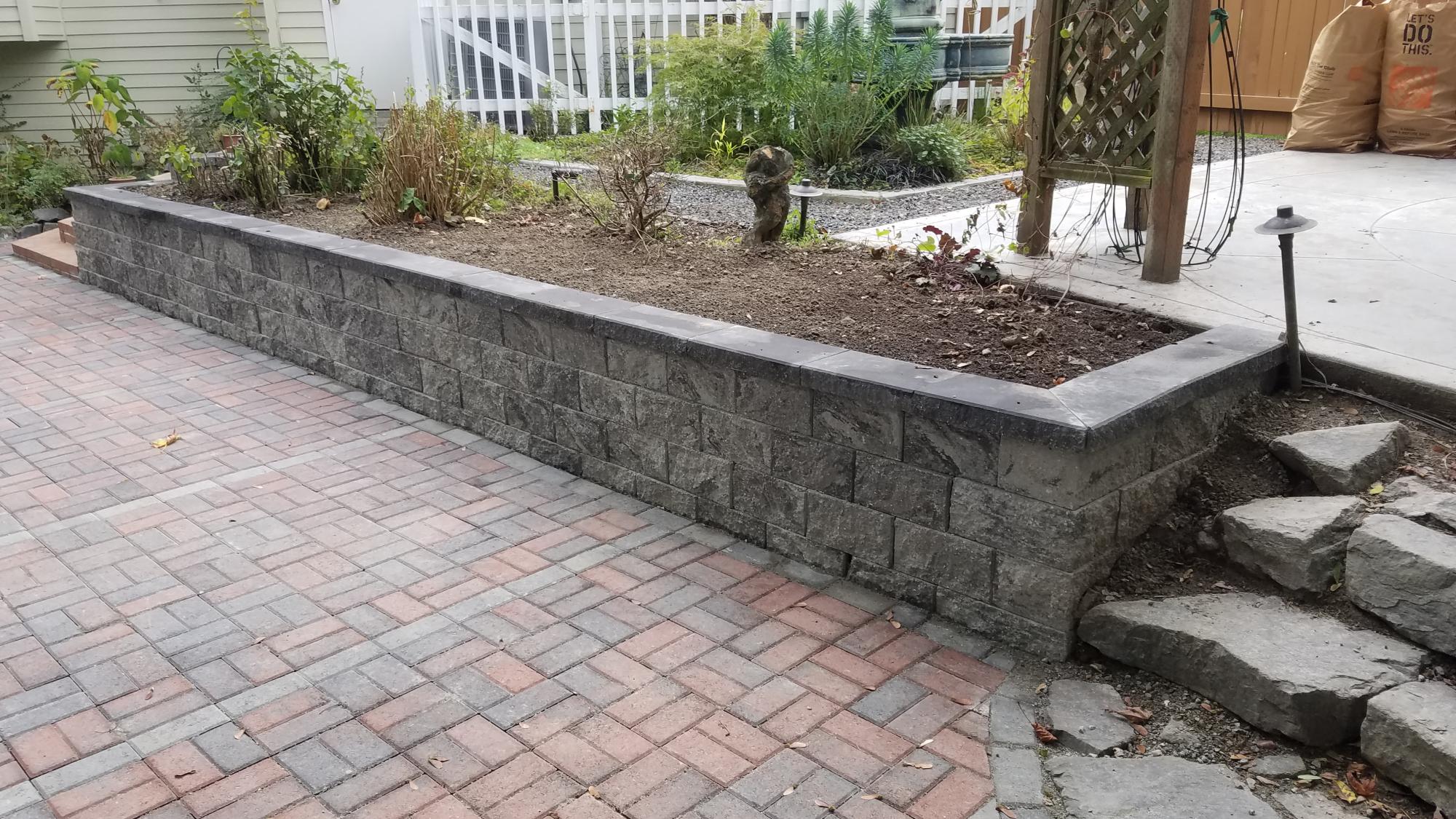 What are the pricing & rates for Rockeries & Retaining Wall services