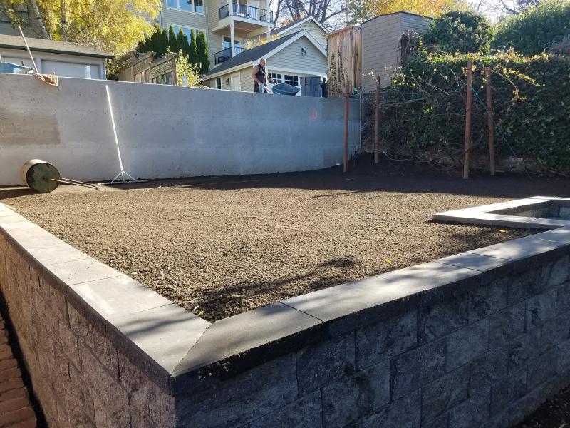 Retaining Walls, Parking Pad, Drain System.