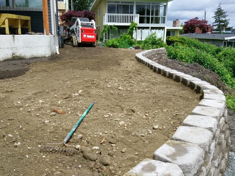  Retaining Walls, Regrading, Sod & Fence Installation.