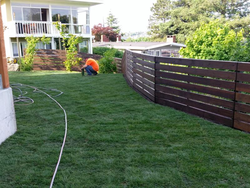  Retaining Walls, Regrading, Sod & Fence Installation.