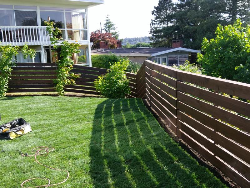  Retaining Walls, Regrading, Sod & Fence Installation.