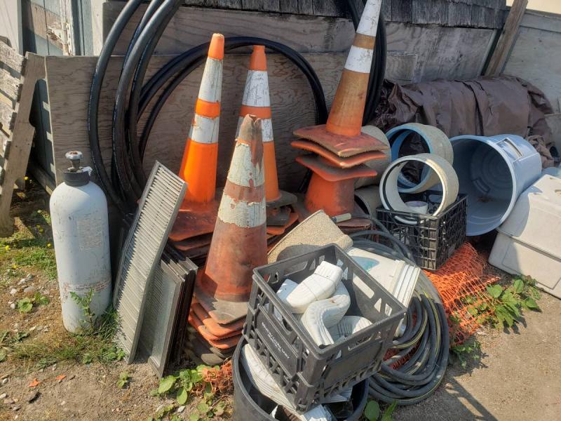 Lots of different kinds of pipe, conduit, downspout pipe. 